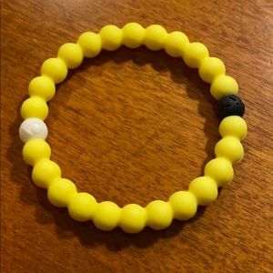 Yellow Lokai bracelet